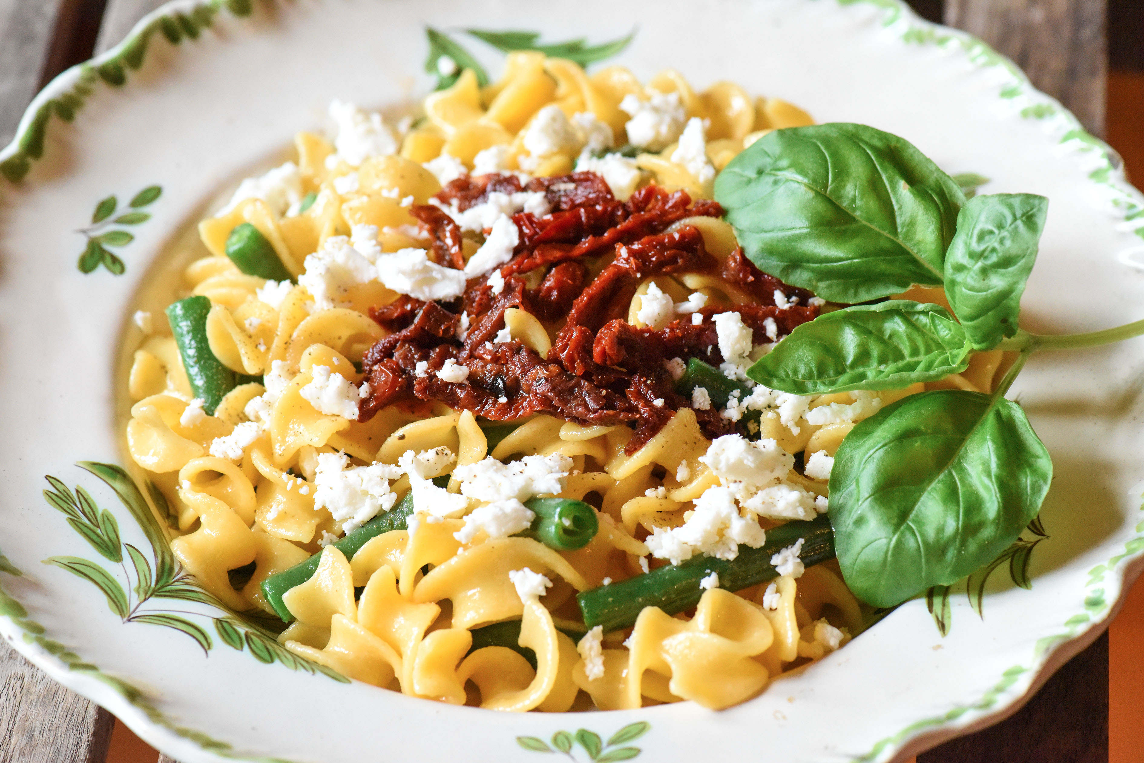 Trucioli pasta with runner beans, dried tomatoes and feta cheese