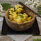 Tagliatelle di mais in brodo “dashi” con tempura di fiori d’acacia