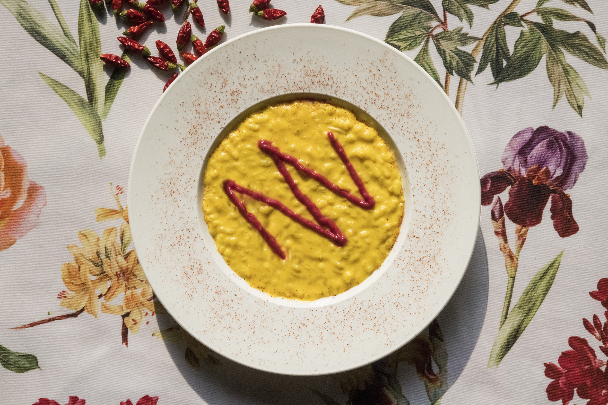 Risotto with pumpkin, curry and beet sauce
